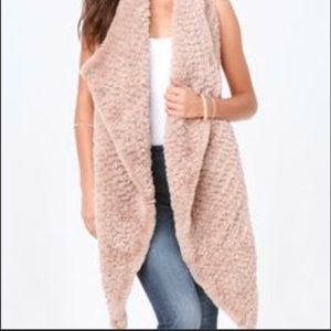 NWT Bebe high low vest